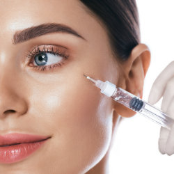 woman receiving facial Botox injection